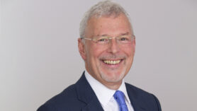 Headshot with blank background of Robert Reekie