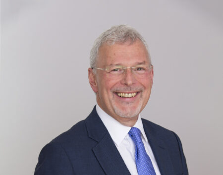 Headshot with blank background of Robert Reekie