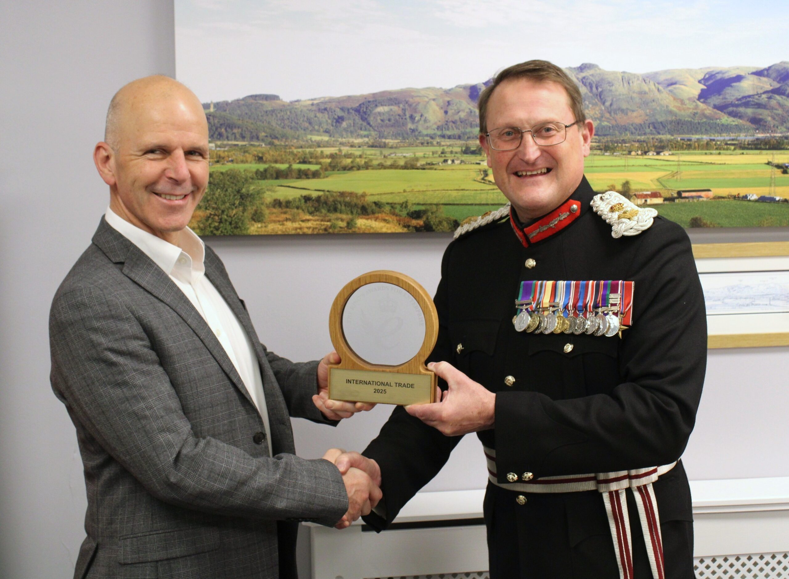 CEO of Symbiosis Colin MacKay recieves the King's Award from the Lord-Lieutenant for Stirling and Falkirk